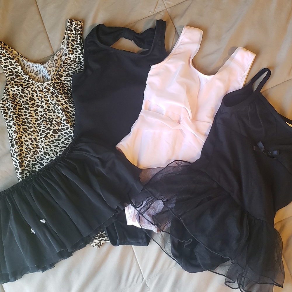 Leotards lot of 4 and 1 skirt